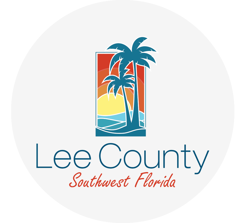 Lee County Southwest Florida logo with palm trees and sunset graphic.