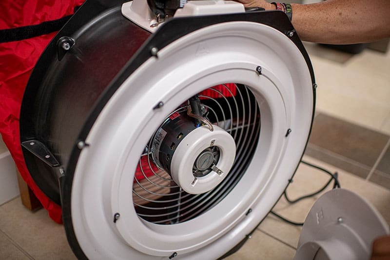 minneapolis-blower-door-fan-assembly-close-up-air-leakage-test-sita. Close-up of a Minneapolis Blower Door fan assembly installed in a doorway for air leakage testing