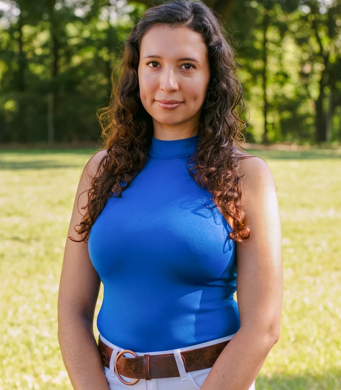 Southern Independent Testing Agency team member in blue standing outdoors for a staff portrait